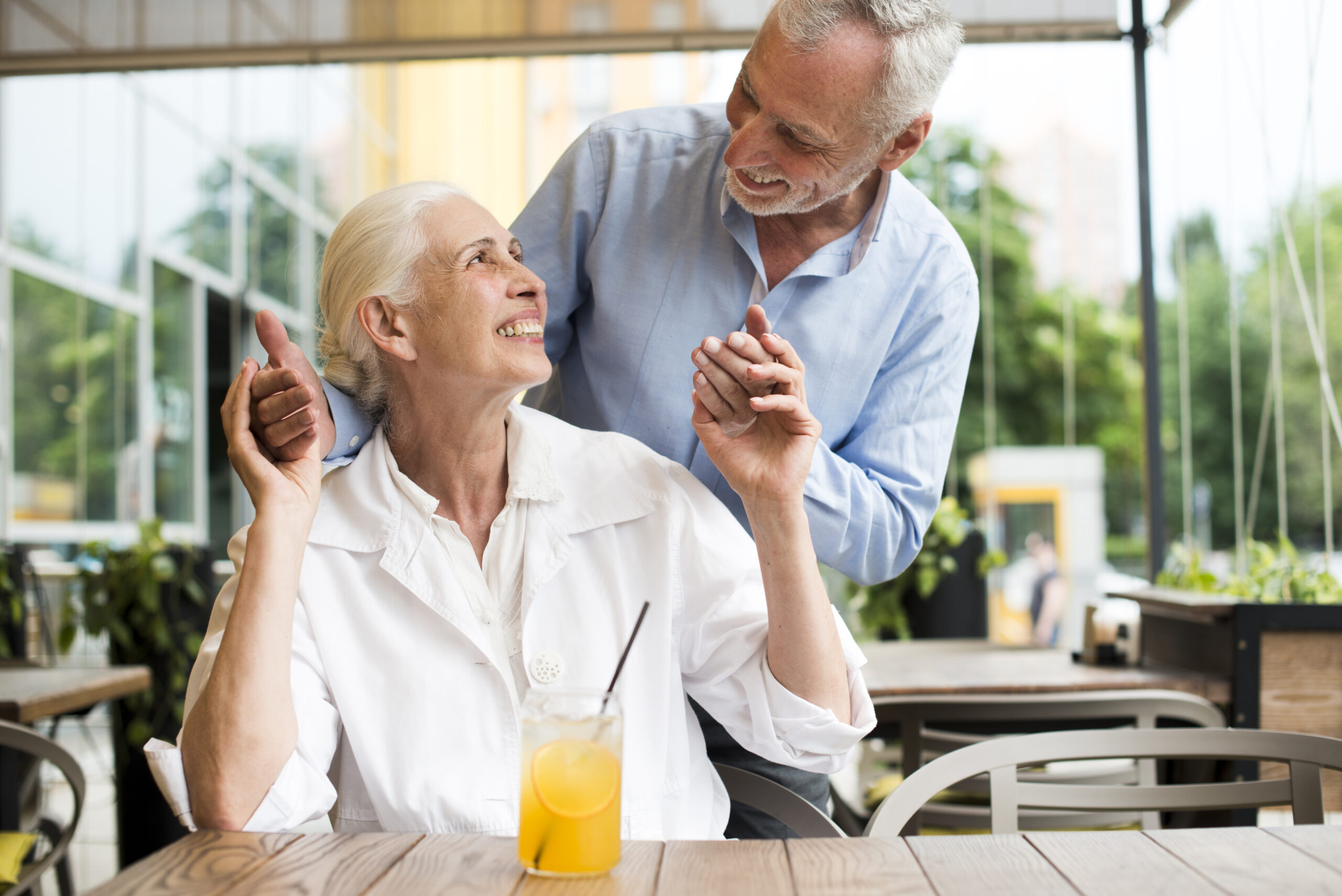 medium-shot-smiley-couple-looking-each-other